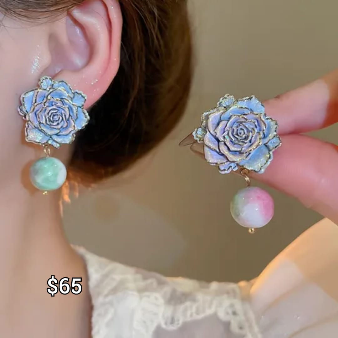 arete flor azul con bolita azulo y blanca