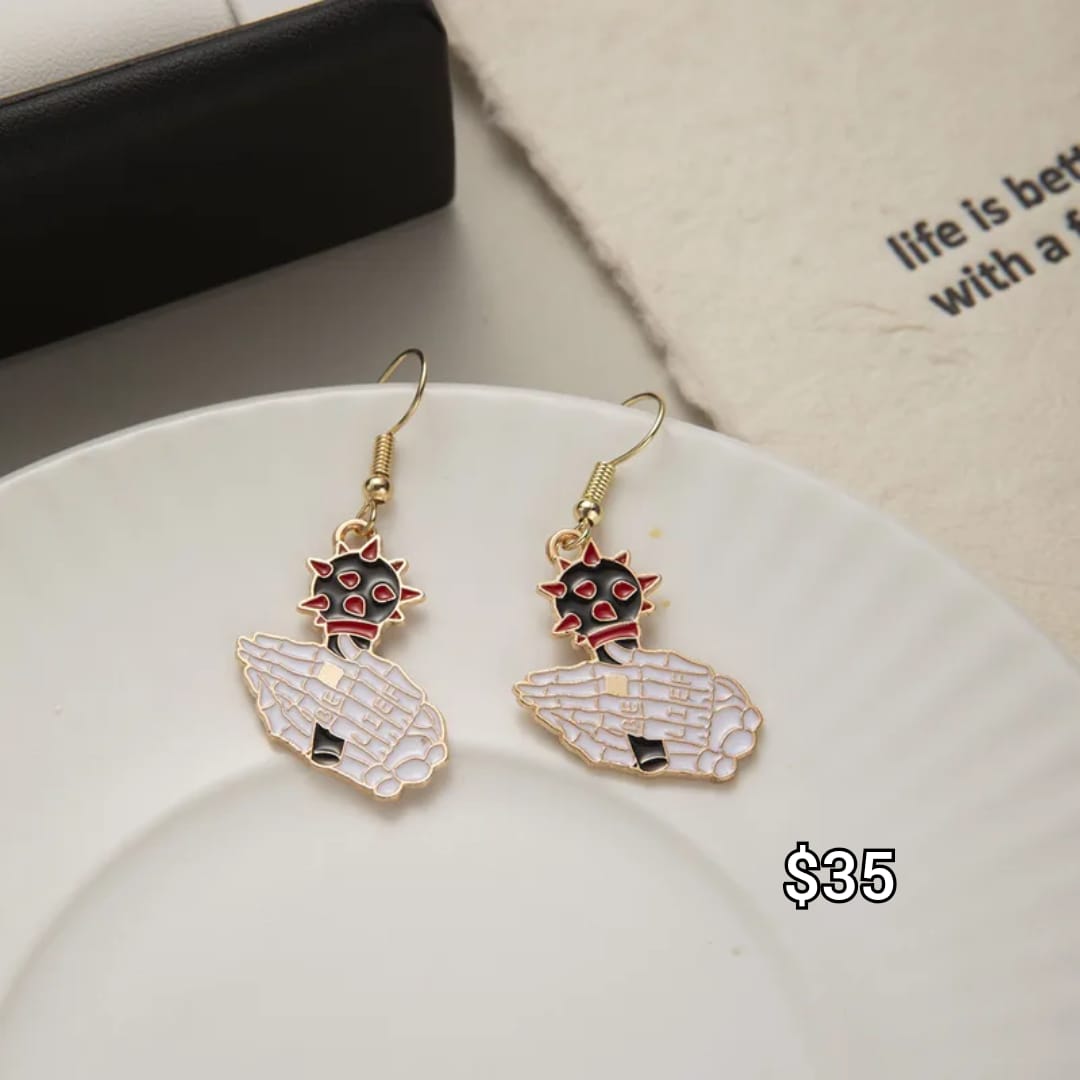arete de mano esquelética con bolita