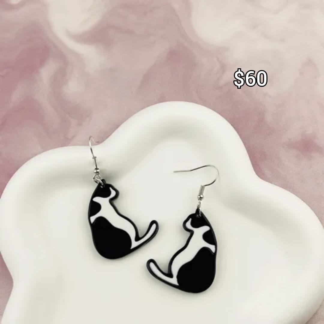 gato blanco con negro