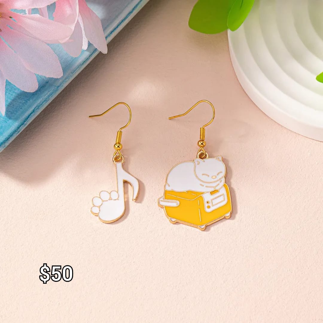 arete gatito en sillón